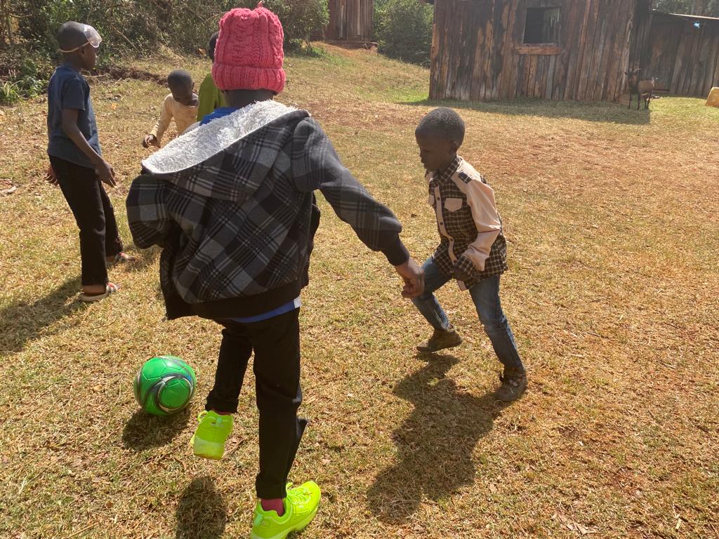 The-kids-playing-football